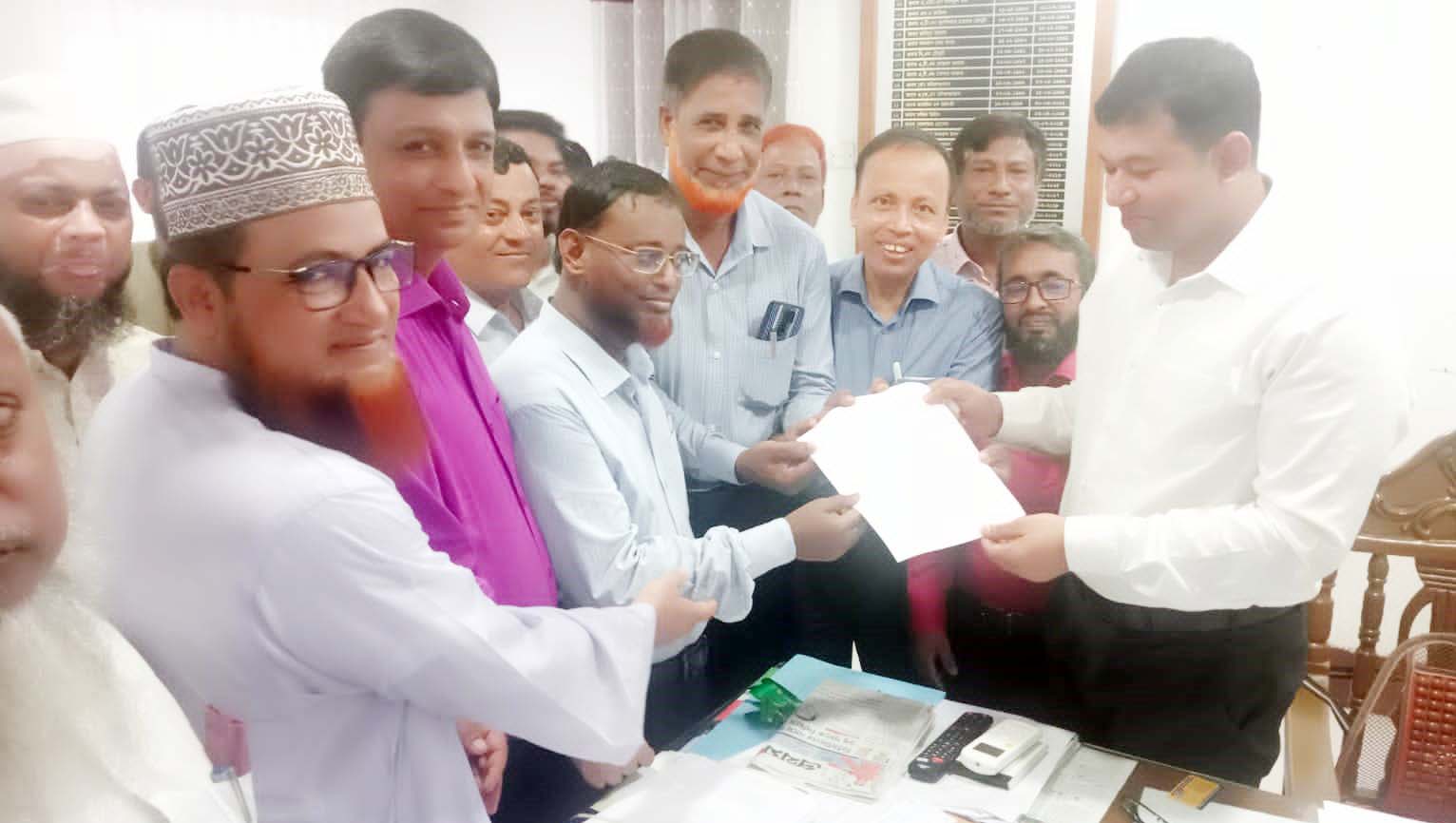 লাকসামে বেসরকারি স্কুল ও মাদ্রাসা শিক্ষকদের মানববন্ধন ও স্মারক লিপি লাকসামে বেসরকারি স্কুল ও মাদ্রাসা শিক্ষকদের মানববন্ধন ও স্মারক লিপি